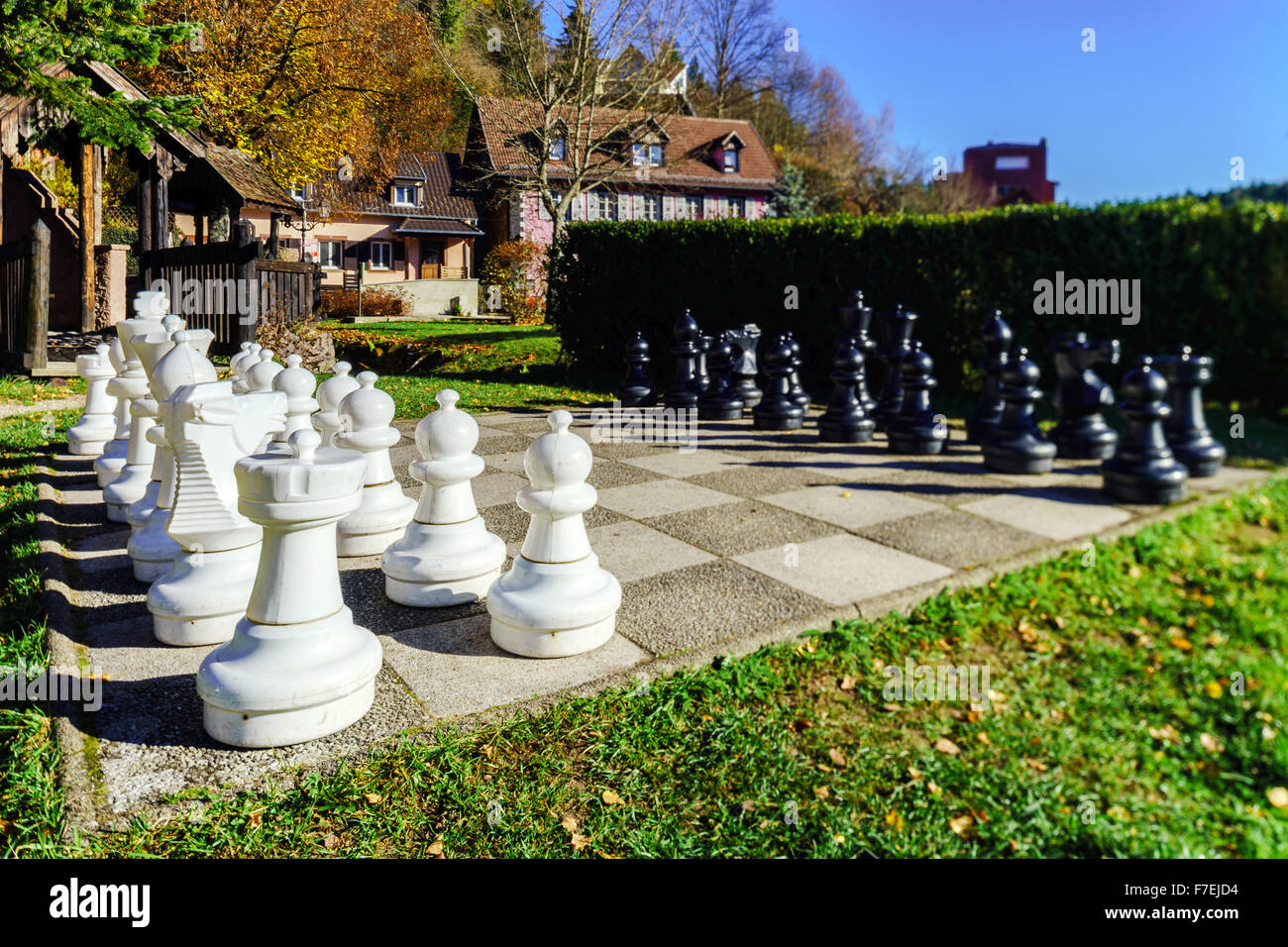 Outdoor chess board with big figures in public park Stock Photo