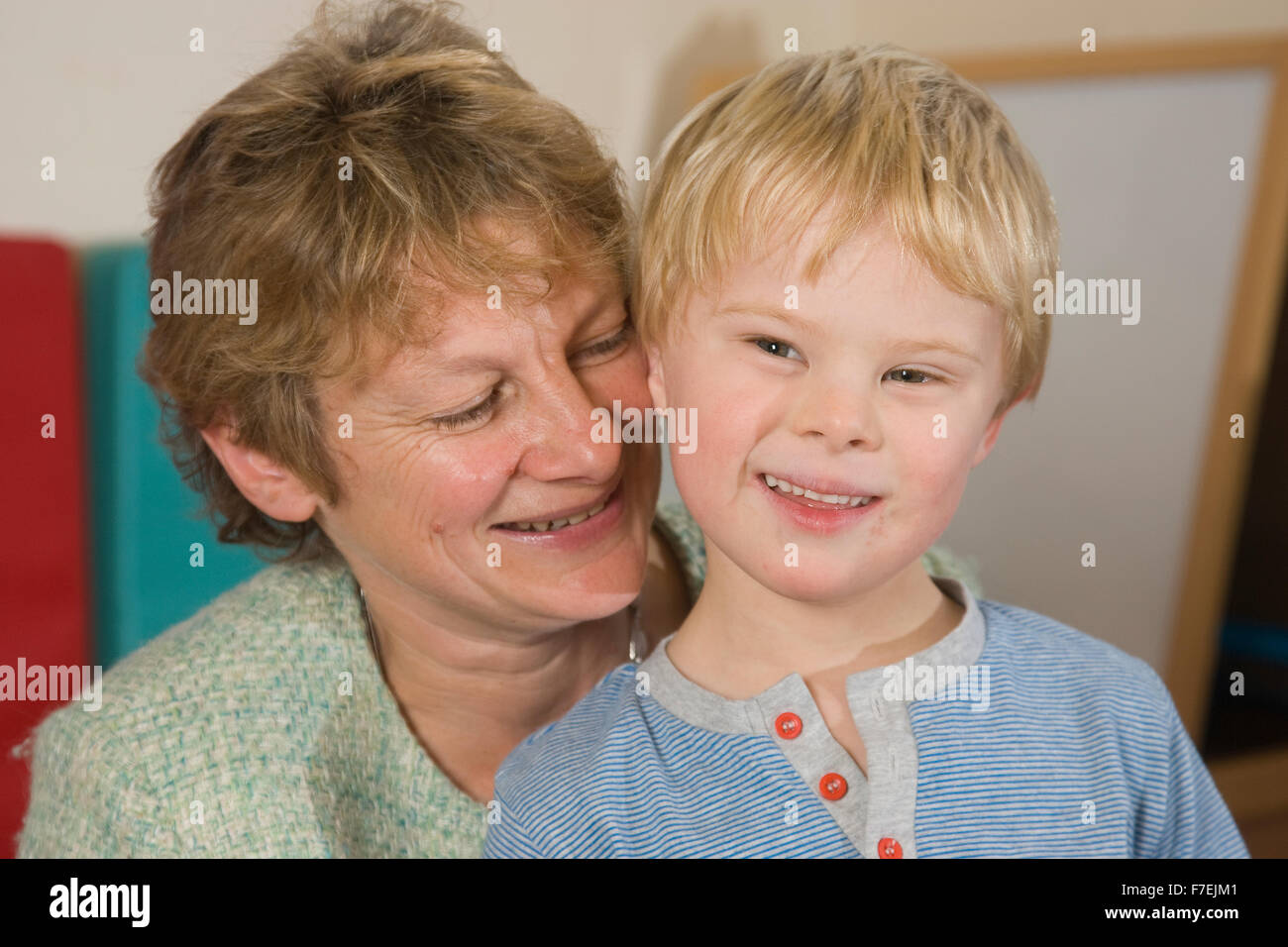 Mother with Down's Syndrome child, England, UK Stock Photo