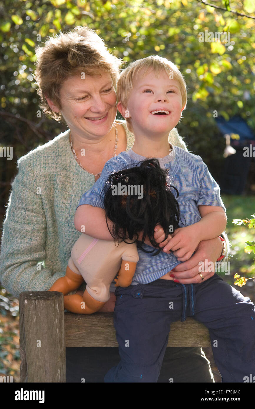 Mother with Down's Syndrome child, England, UK Stock Photo