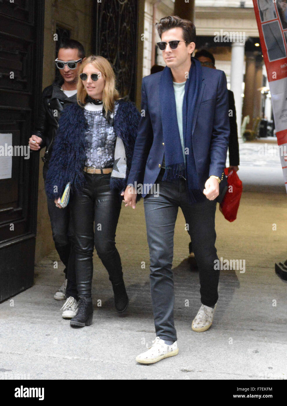 Mark Ronson and his wife Josephine de la Baume hold hands as they leave Il  Salumaio restaurant after lunch with friends Pietro Tavallini, Francesca  Versace for a shopping spree at Versace and