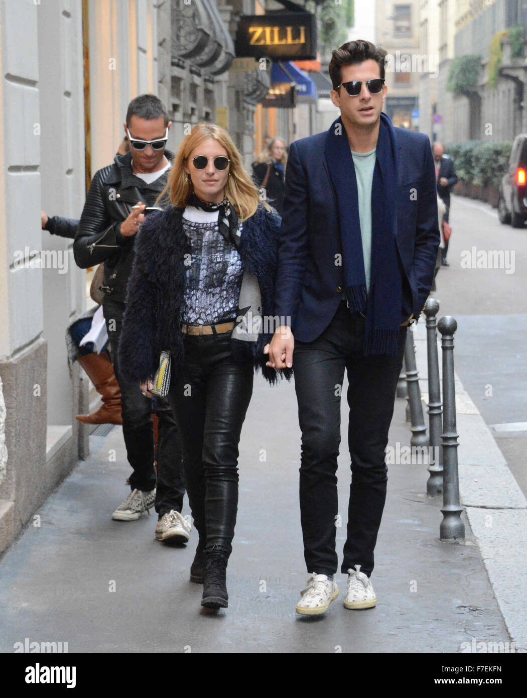Mark Ronson and his wife Josephine de la Baume hold hands as they leave Il Salumaio restaurant after lunch with friends Pietro Tavallini, Francesca Versace for a shopping spree at Versace and Brioni  Featuring: View, Mark Ronson, Josephine de la Baume, Pi Stock Photo