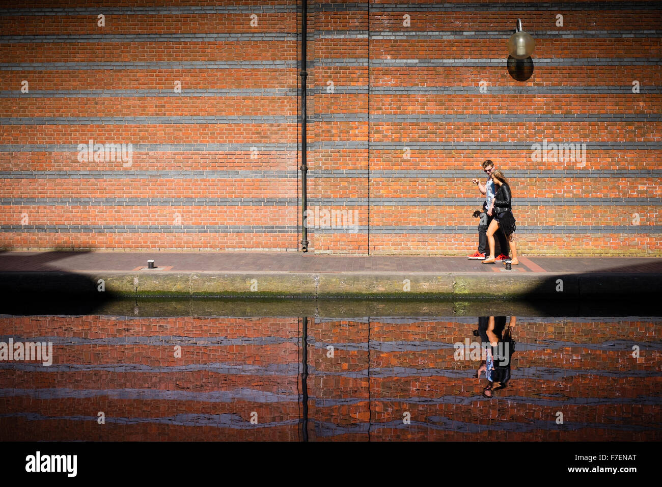 Two people walking side by side hi-res stock photography and images - Alamy