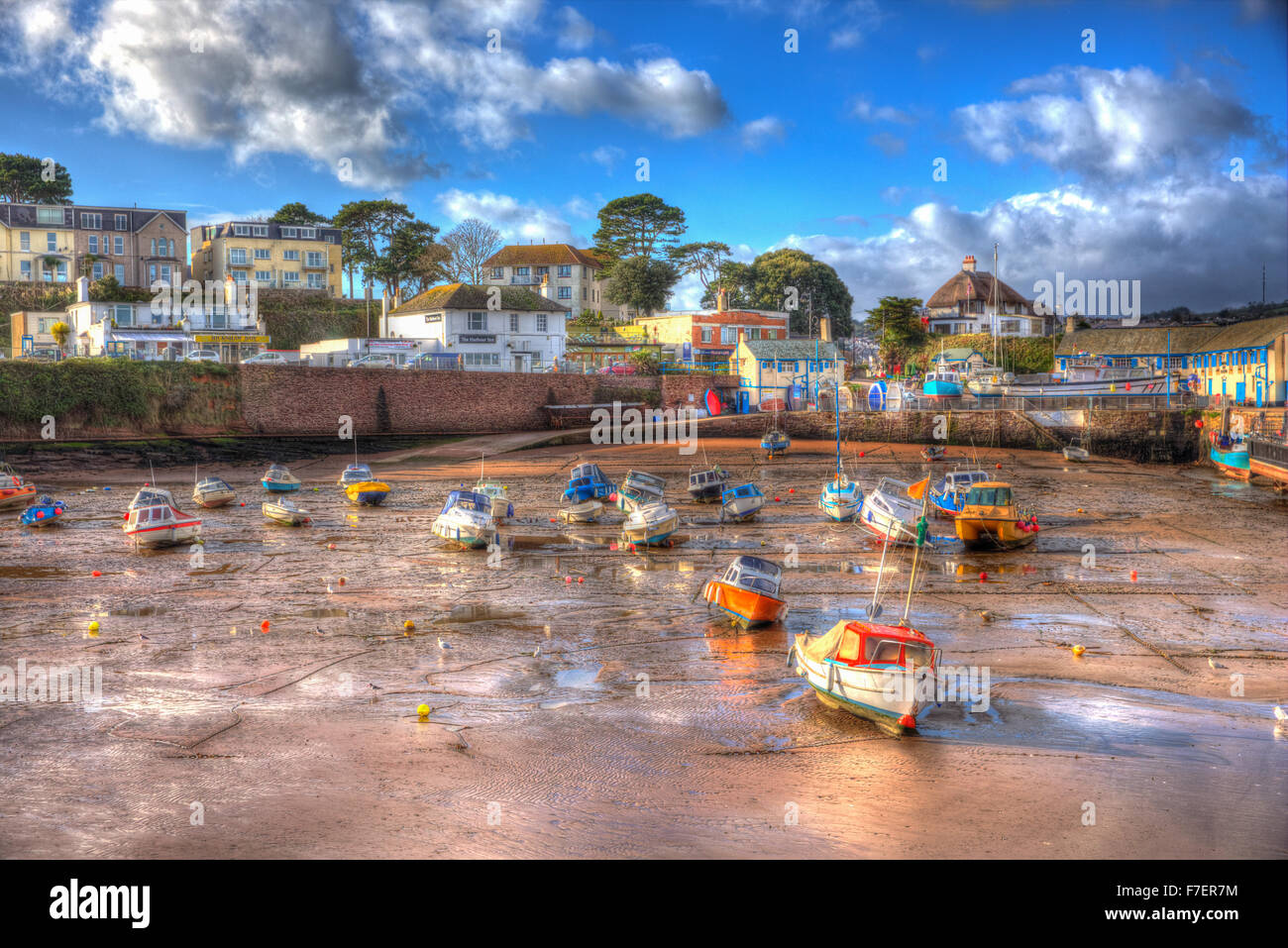 Paignton harbour Devon England uk in colourful HDR with boats at low tide and near Torquay Stock Photo
