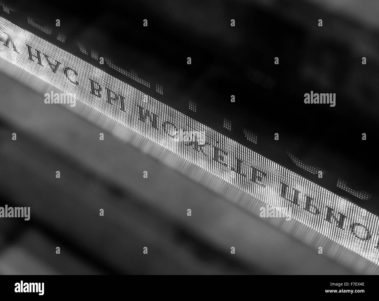 Monochrome photograph of LED advertising in Russian in a pool of a rainwater puddle on a city street. Stock Photo