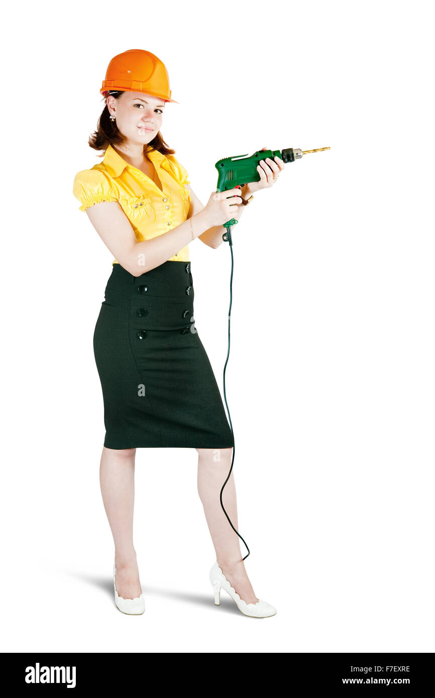 beauty girl in hard hat with drill. Isolated over white Stock Photo Alamy