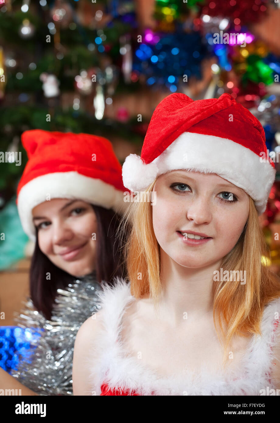 Happy girls celebrating Christmas at them home Stock Photo - Alamy