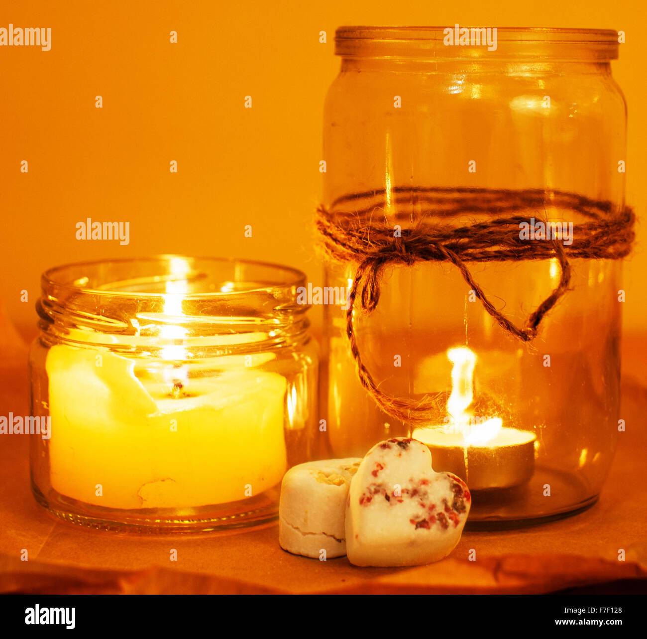 candles in glass burning romantic celecration concept wooden kitchen