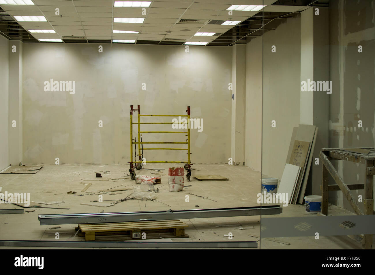 Renovation and construction work on an empty shop unit to prepare the building interior for new Stock Photo