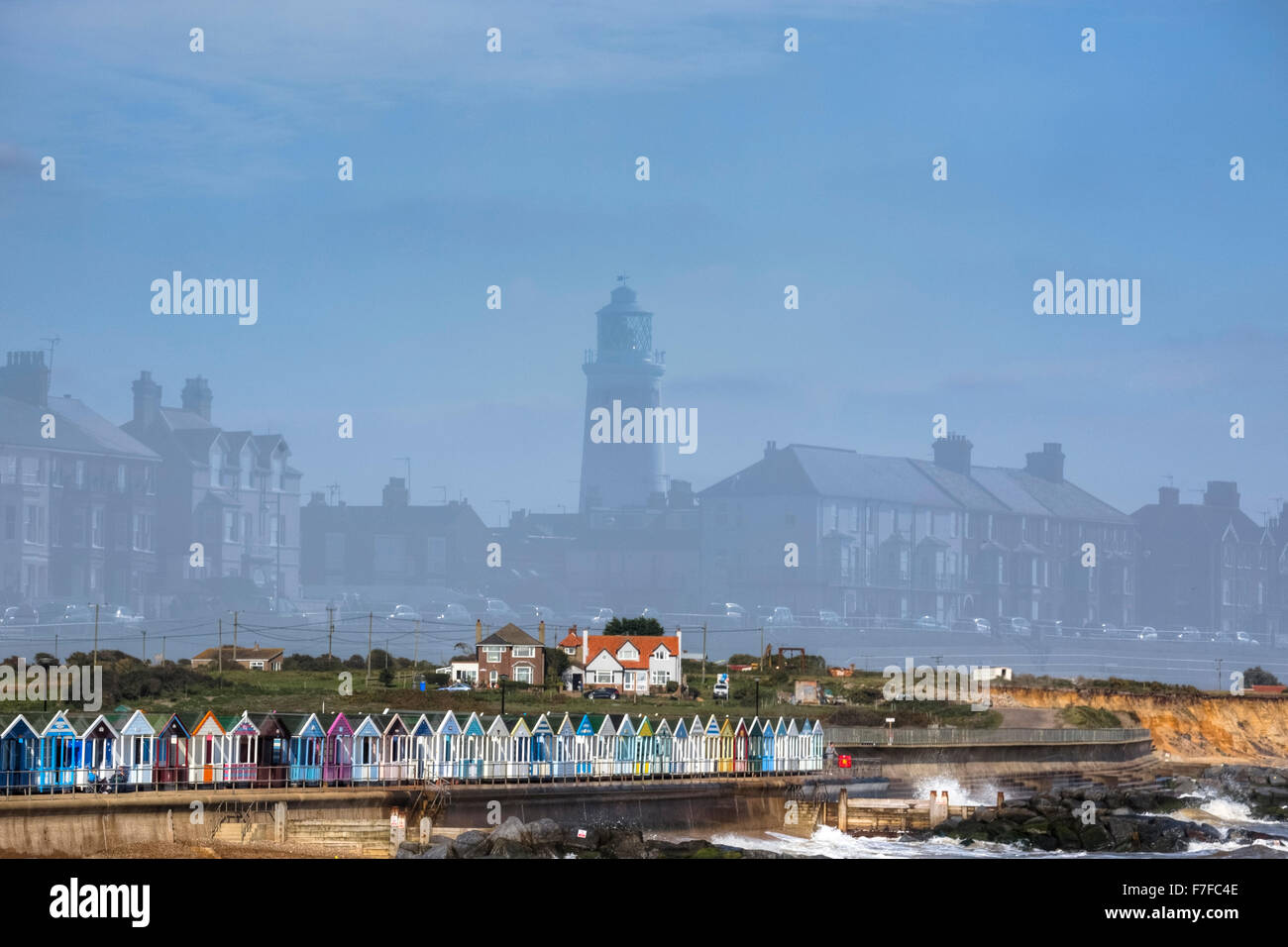 Southwold, beach huts, with reflection of the light house, Suffolk, England, UK Stock Photo
