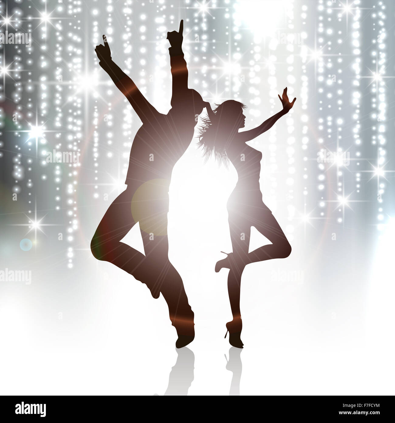 Silhouettes of people dancing on a sparkle background Stock Photo