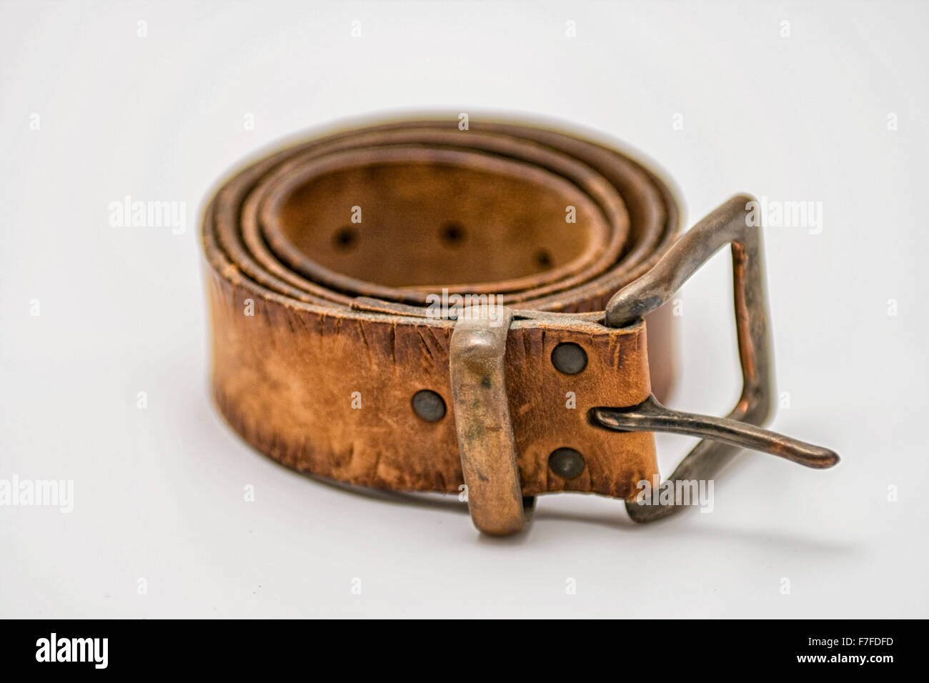 Grungy, sturdy brown leather belt Stock Photo