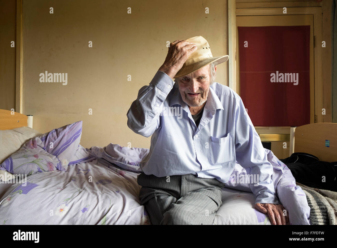 Impoverished bedridden man, Alderton, Suffolk, UK. Stock Photo