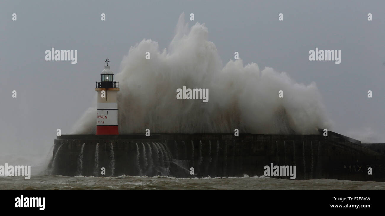 Newhaven, UK. 30th Nov, 2015. Giant waves crash against the Newhaven harbour lighthouse as strong winds continue in the wake of storm Clodagh in East Sussex coast, UK Monday November 30, 2015.  Regions of Britain continued to be subject to yellow weather warnings for gusting winds upto 60mph. Credit:  Luke MacGregor/Alamy Live News Stock Photo