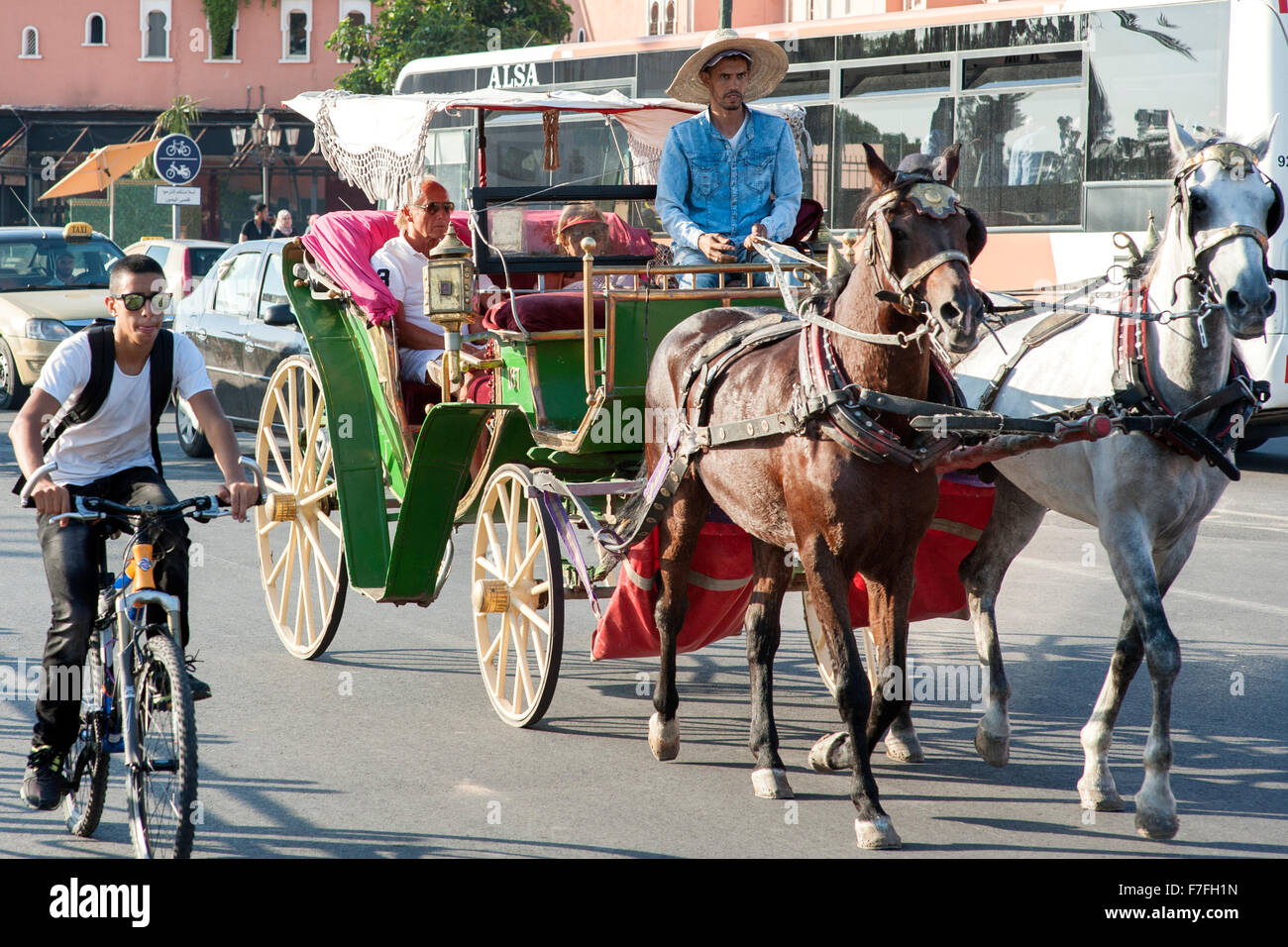 Horse drawn carriage on a street in Marrakech, Morocco. Stock Photo