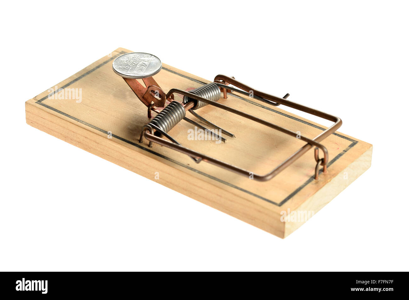 Mousetrap with silver coin as bait isolated over white background Stock Photo