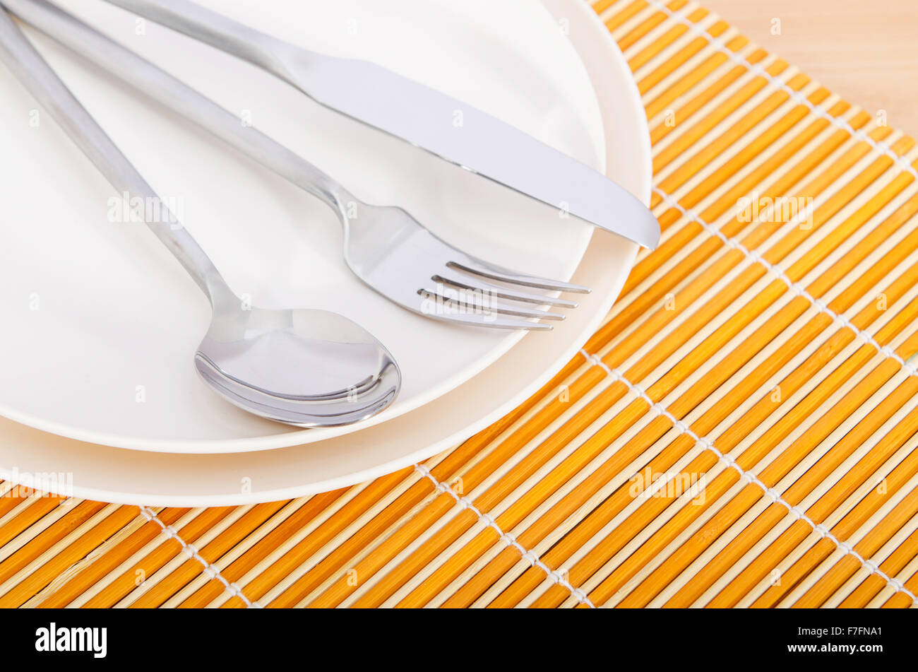 Table setting with knife and fork Stock Photo - Alamy