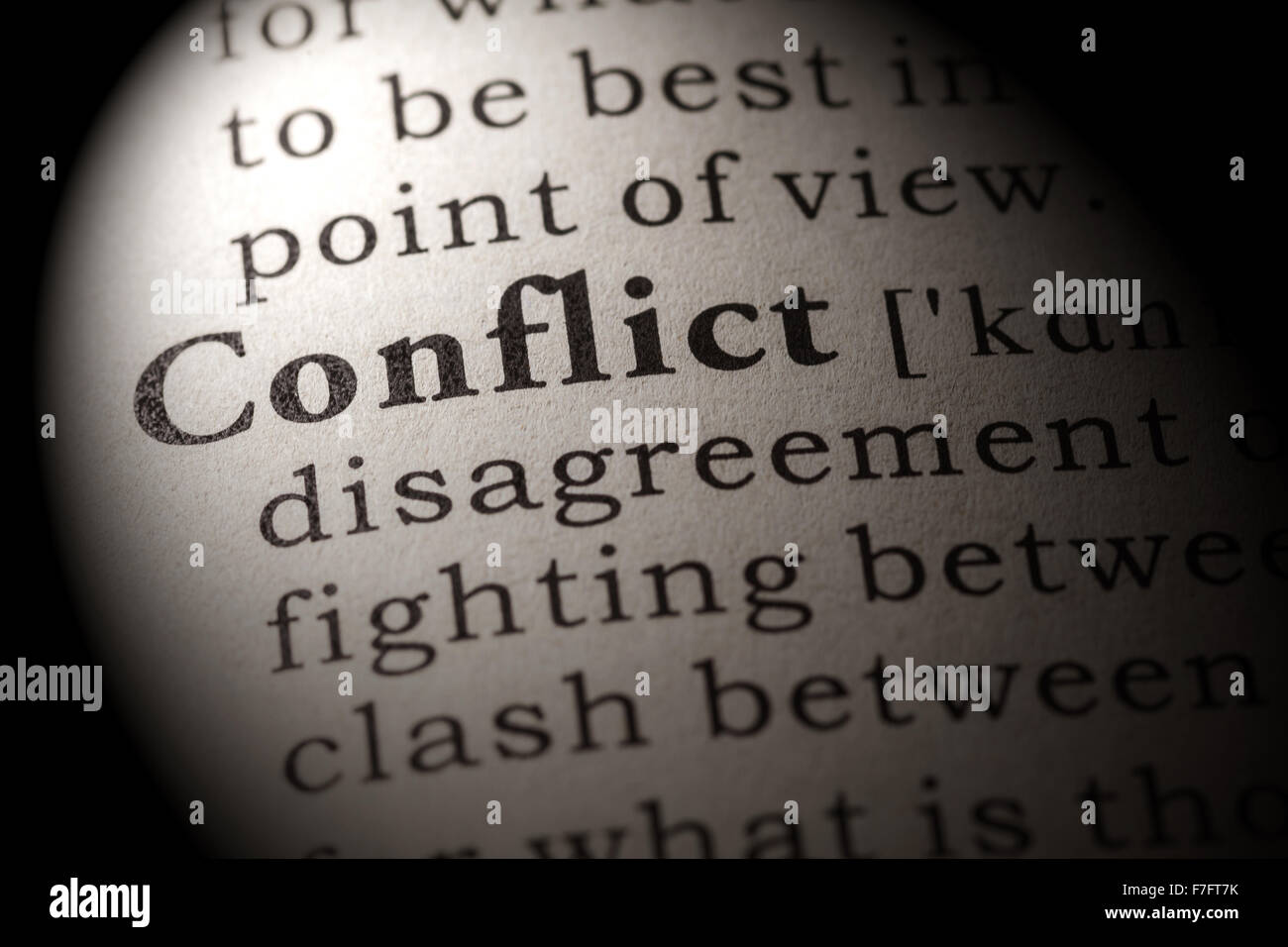 Fake Dictionary, Dictionary definition of the word conflict Stock Photo