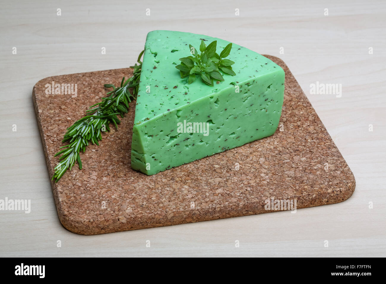 Green pesto cheese with rosemary basil leaves Stock Photo Alamy