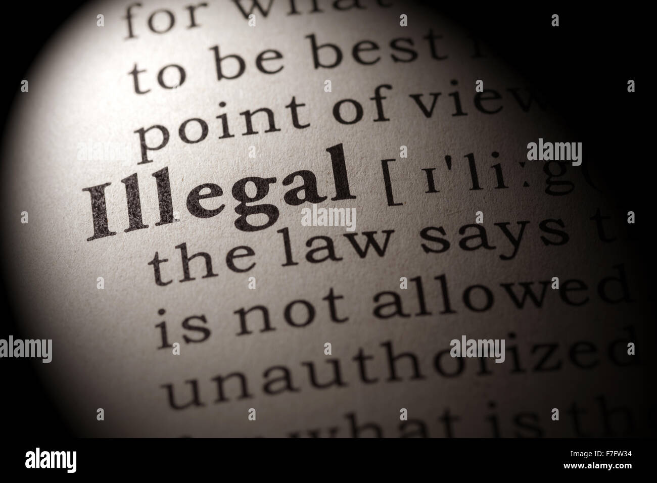 Fake Dictionary, Dictionary definition of the word illegal Stock Photo
