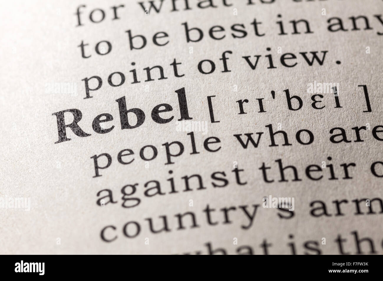 Fake Dictionary, Dictionary definition of the word rebel Stock Photo