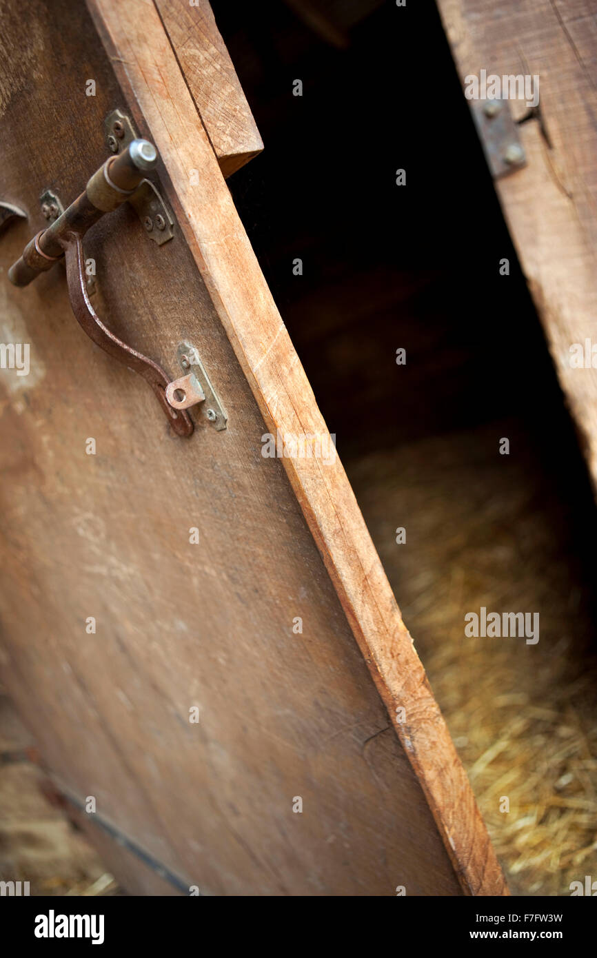 Lock of an old wooden door in a barn Stock Photo - Alamy