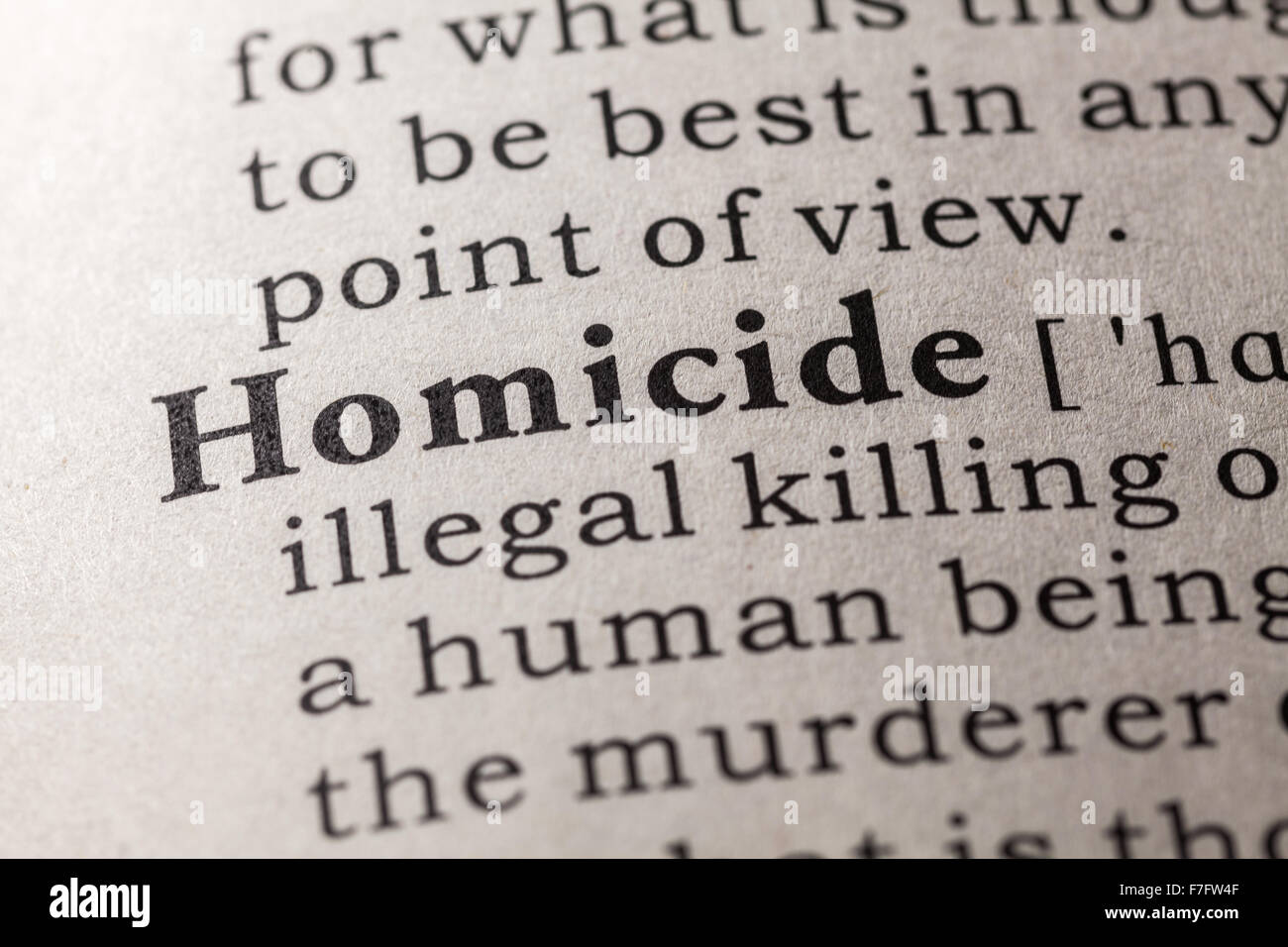 Fake Dictionary, Dictionary definition of the word homicide Stock Photo