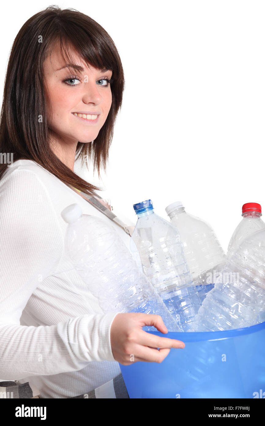 Girl taking the recycling out Stock Photo