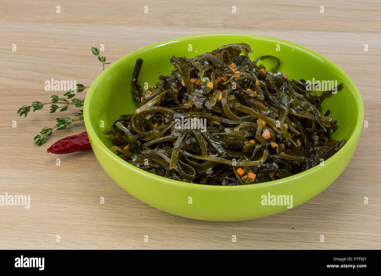 Marinated Laminaria salad in the bowl with spices Stock Photo - Alamy