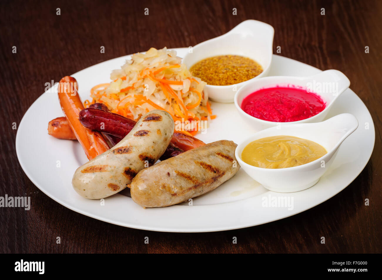 german sausages with cabbage Stock Photo Alamy