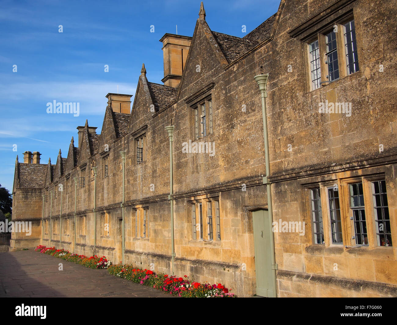 The Almshouses built out of Cotswold stone with stone tiles on the roof, called slates, built in 1612 in Chipping Campden, UK. Stock Photo