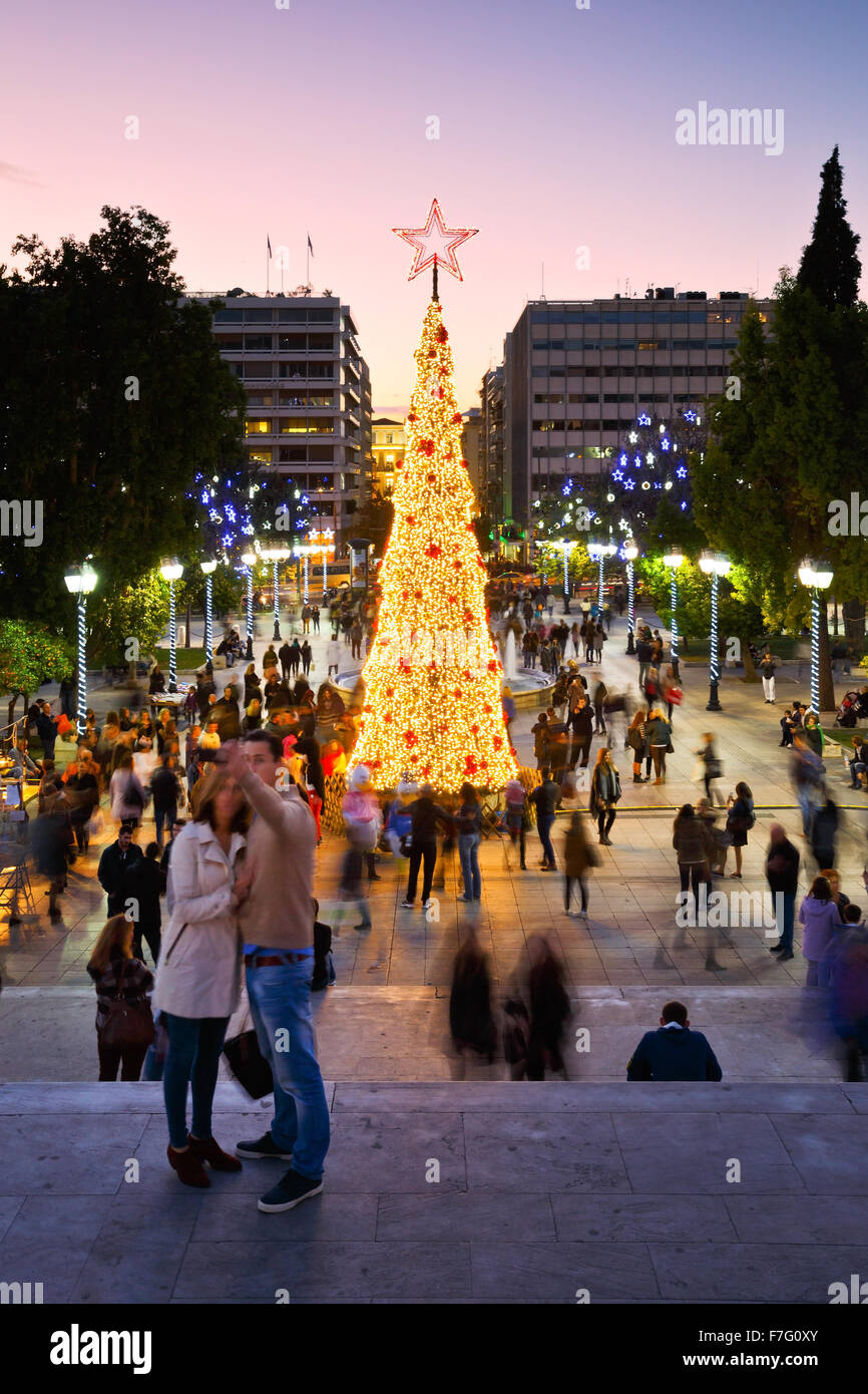 People at a christmas tree in Syntagma square during the advent before