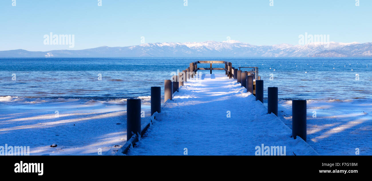 Snow covered pier at Camp Richardson Beach, South Lake Tahoe, CA Stock Photo