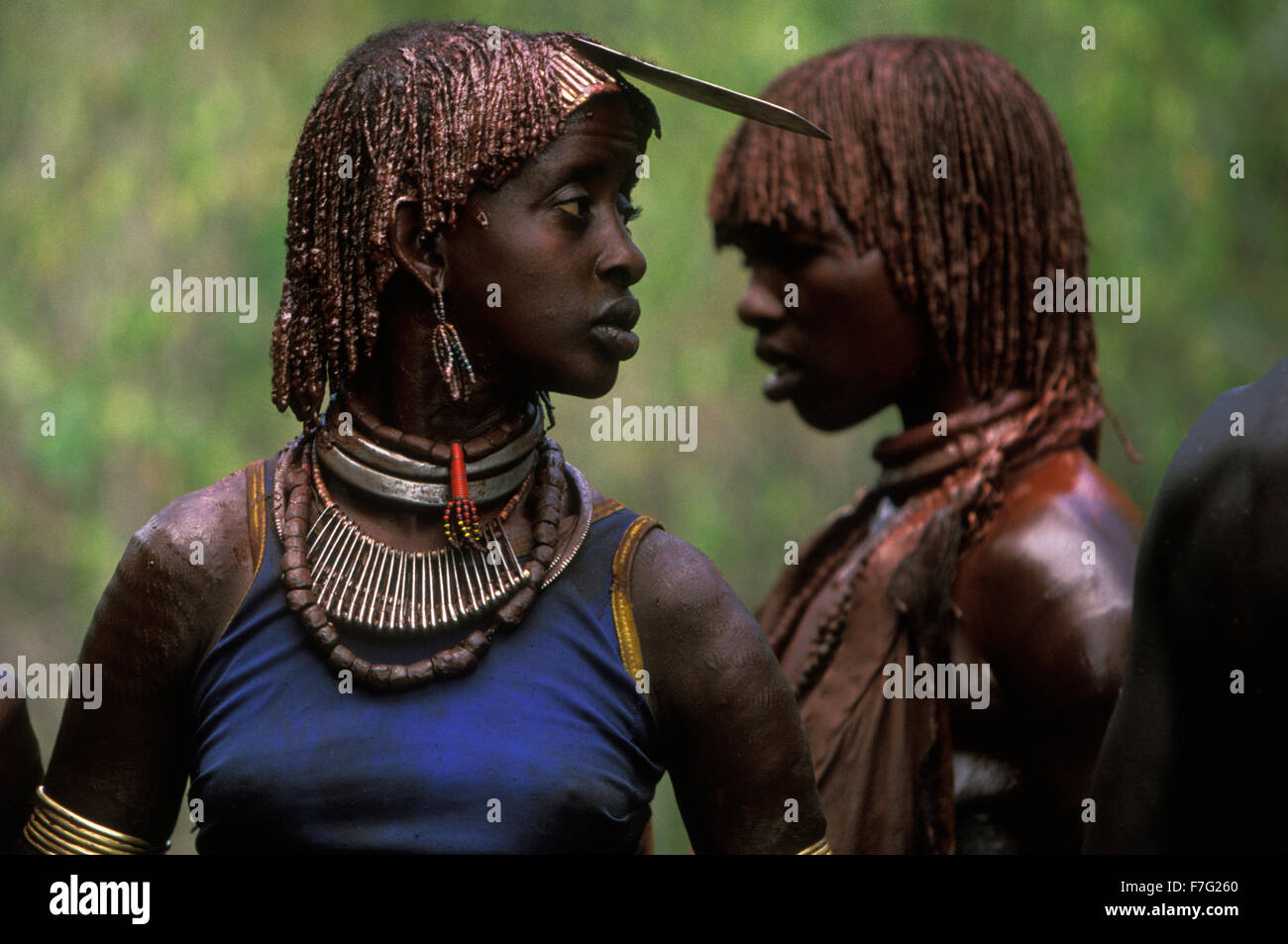 Two Hamar women dance at a bull jump, a pre-marriage ritual among the Hamar of Ethiopia Stock Photo