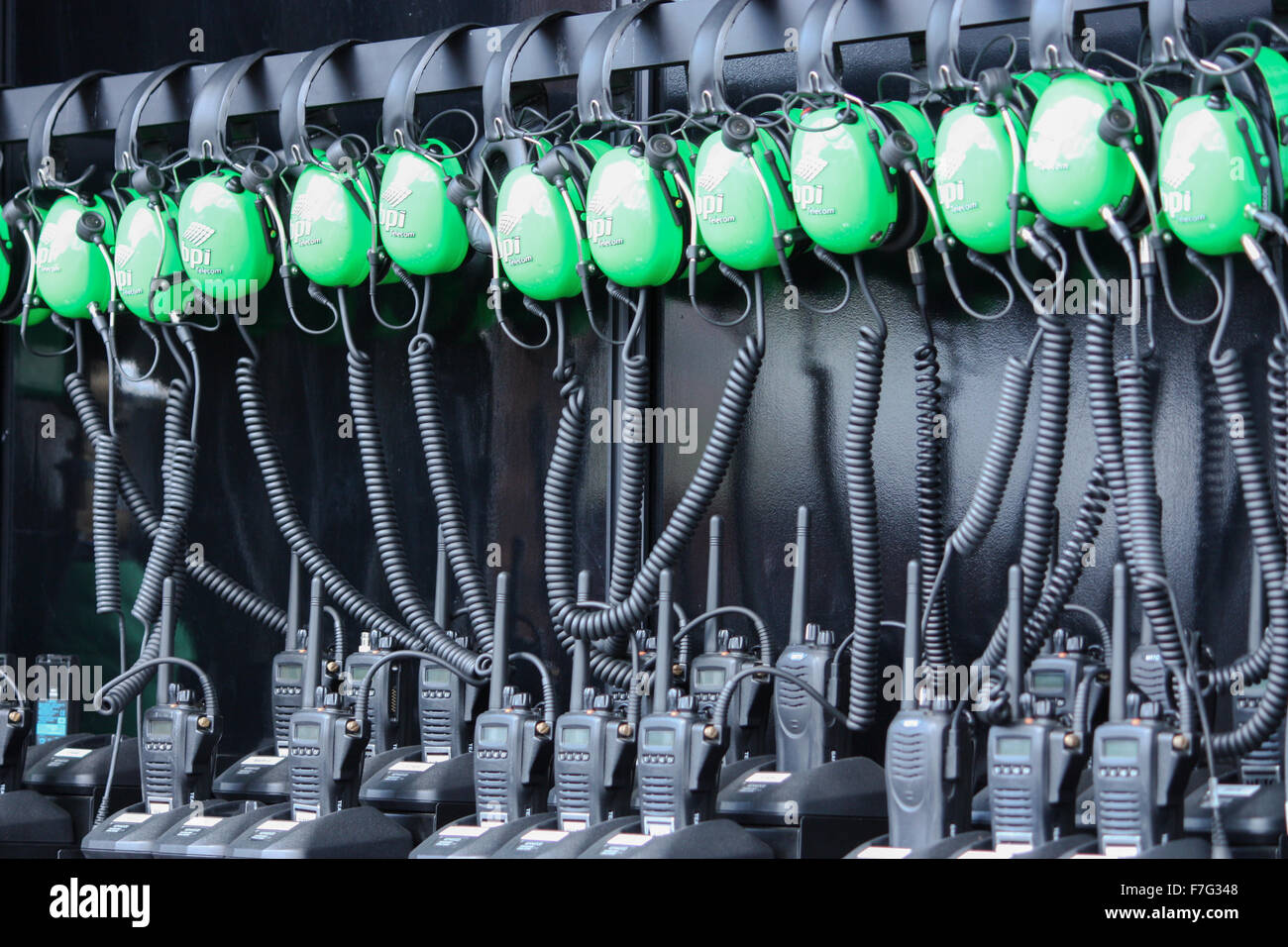 Green BPI Telecom headphones in pit at Brands Hatch Stock Photo