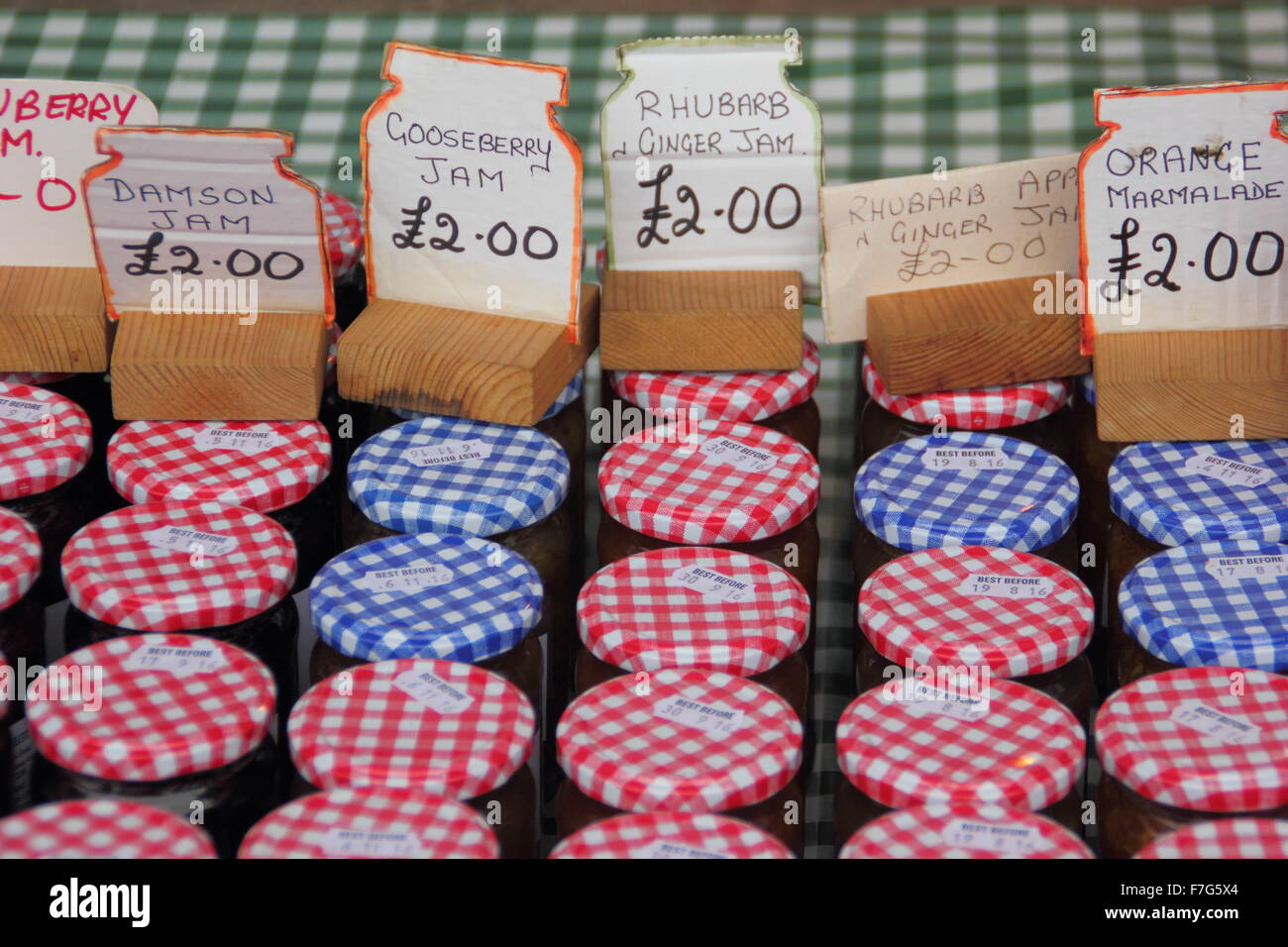 A selection of preserves for sale on a stall at a farmers' market in Derbyshire, England UK Stock Photo