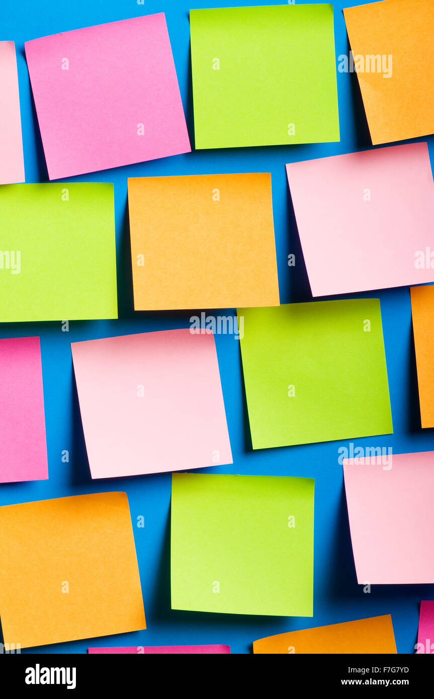 Reminder notes on the bright colorful paper Stock Photo - Alamy