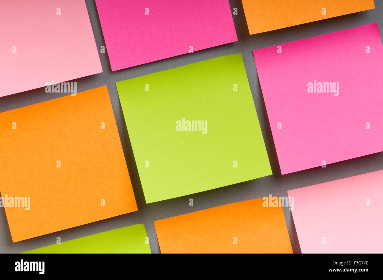 Reminder notes on the bright colorful paper Stock Photo - Alamy