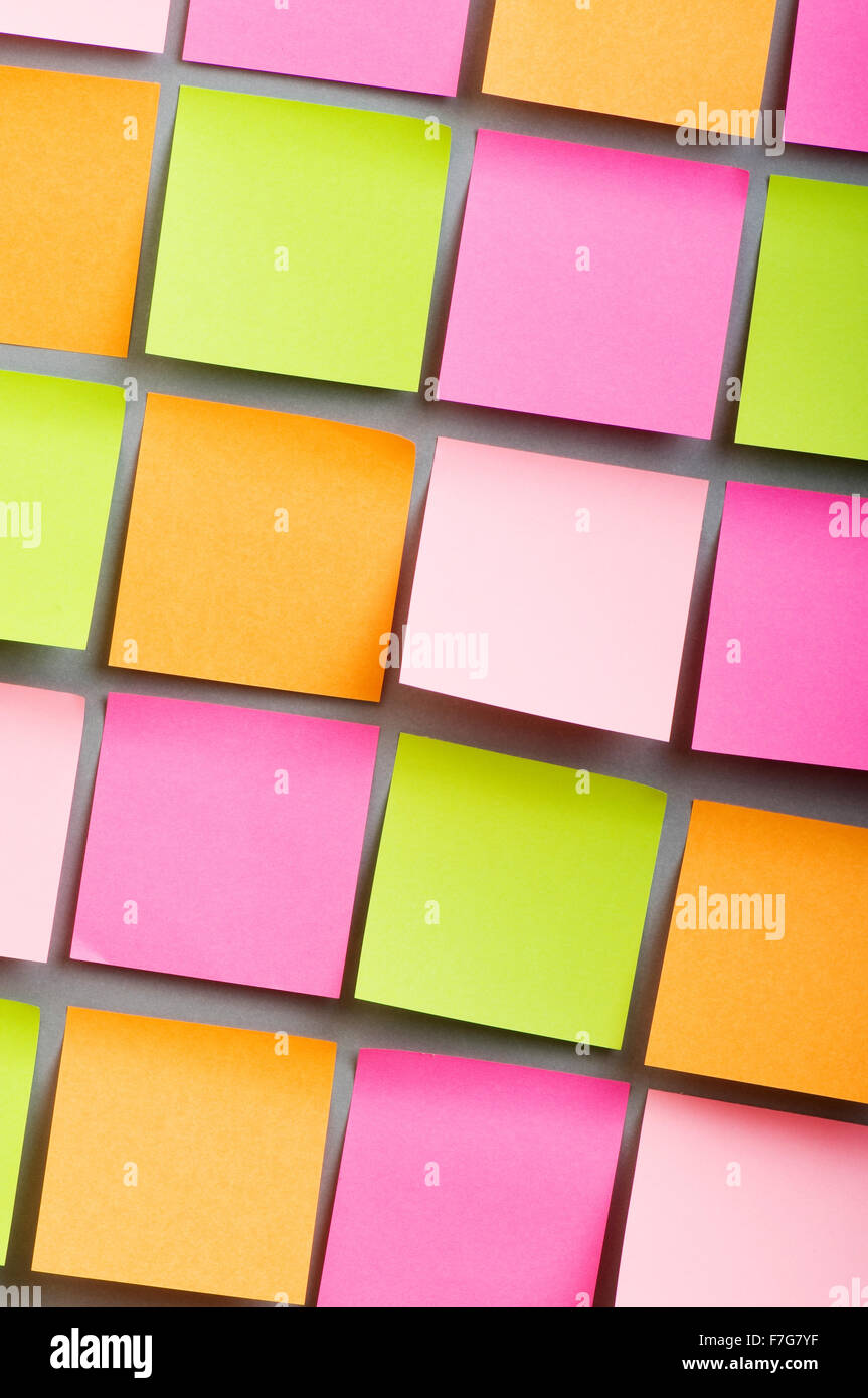 Reminder notes on the bright colorful paper Stock Photo - Alamy