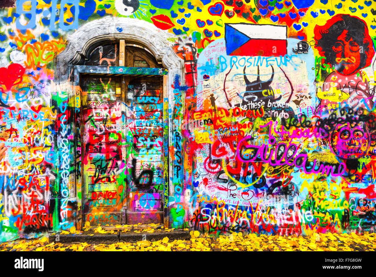 PRAGUE, CZECH REPUBLIC - NOVEMBER 06: The Lennon Wall since the 1980s filled with John Lennon-inspired graffiti and pieces of ly Stock Photo