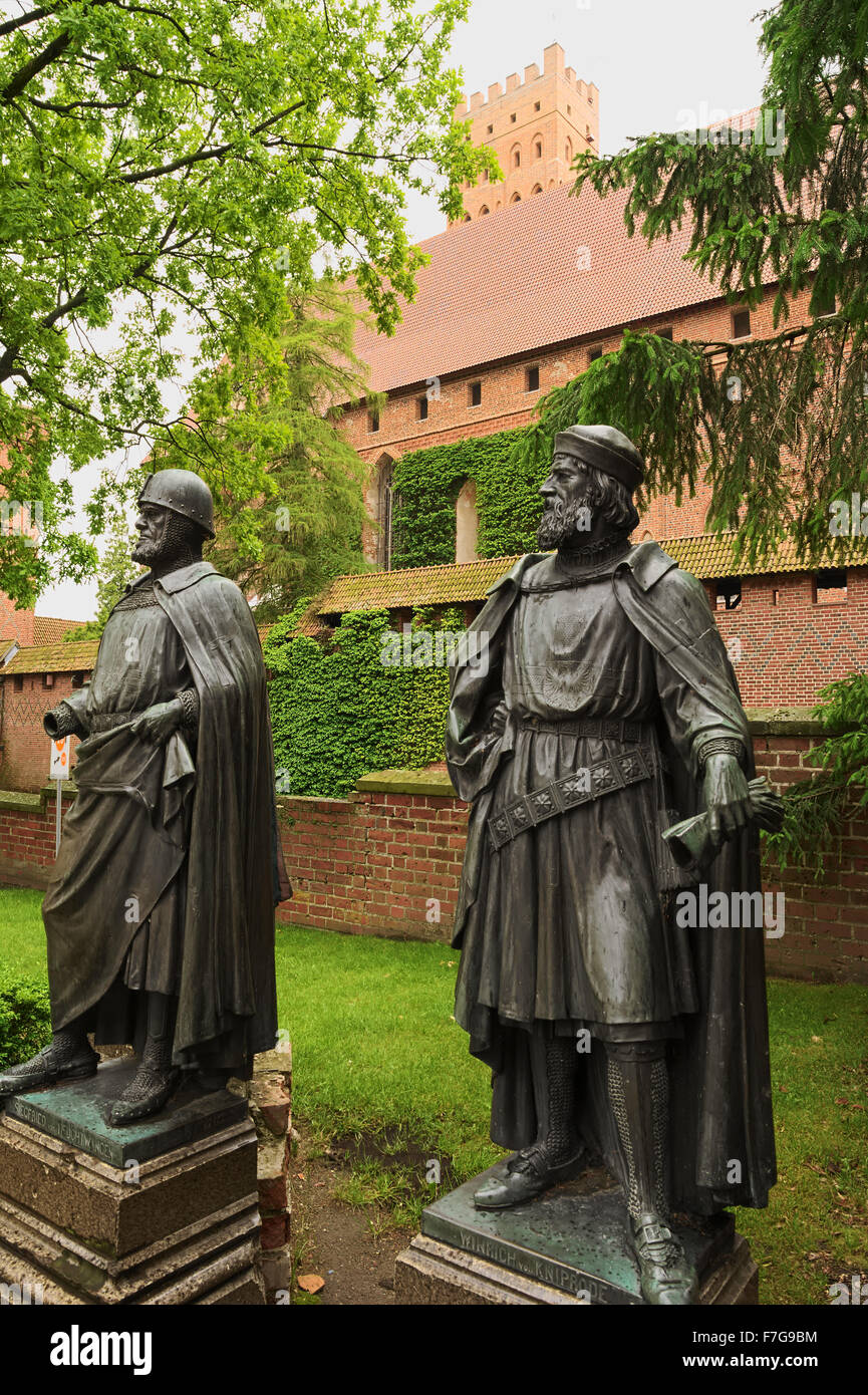 Statues of Grand Masters of the Teutonic Knights in the medieval Castle in Malbork (Marienburg), Poland. Stock Photo