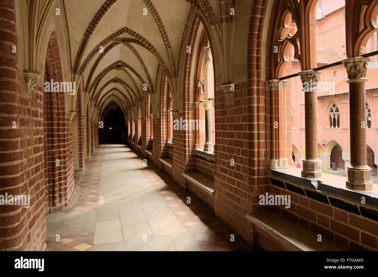 Cloister in the medieval Castle of the Teutonic Order in Malbork (Marienburg), Poland. Stock Photo