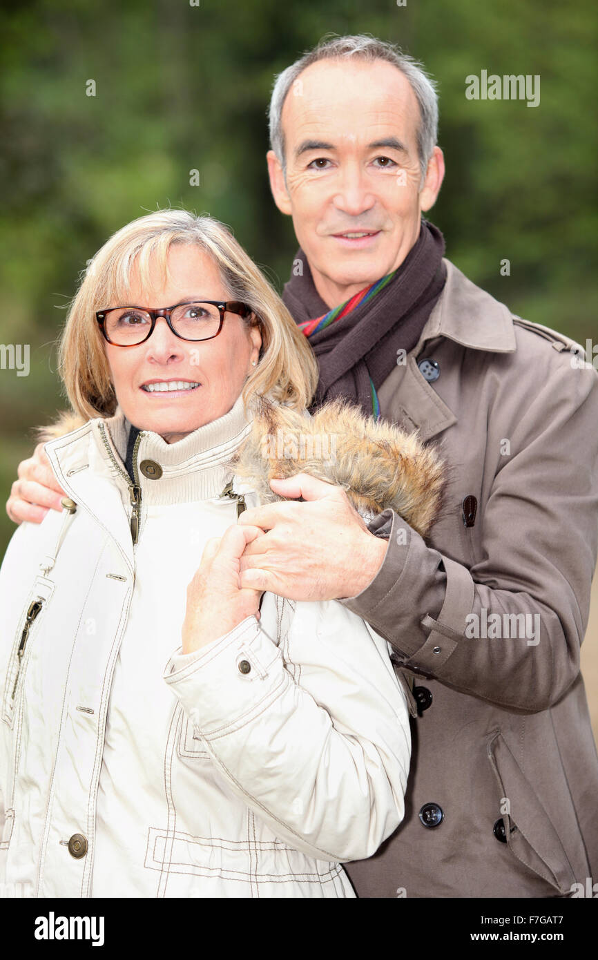 Portrait of a happy couple outdoors on a winter's day Stock Photo - Alamy