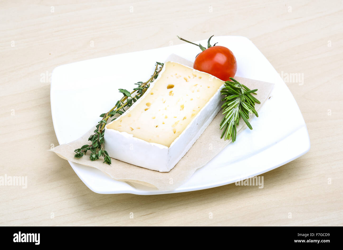Soft brie cheese with rosemary, thyme and toast bread Stock Photo Alamy