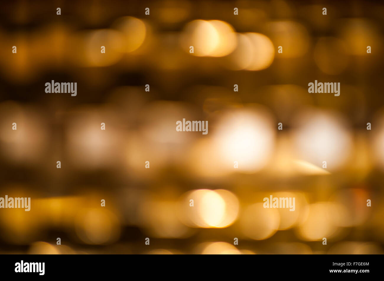 Golden background of blurred yellow and silver lights Stock Photo - Alamy