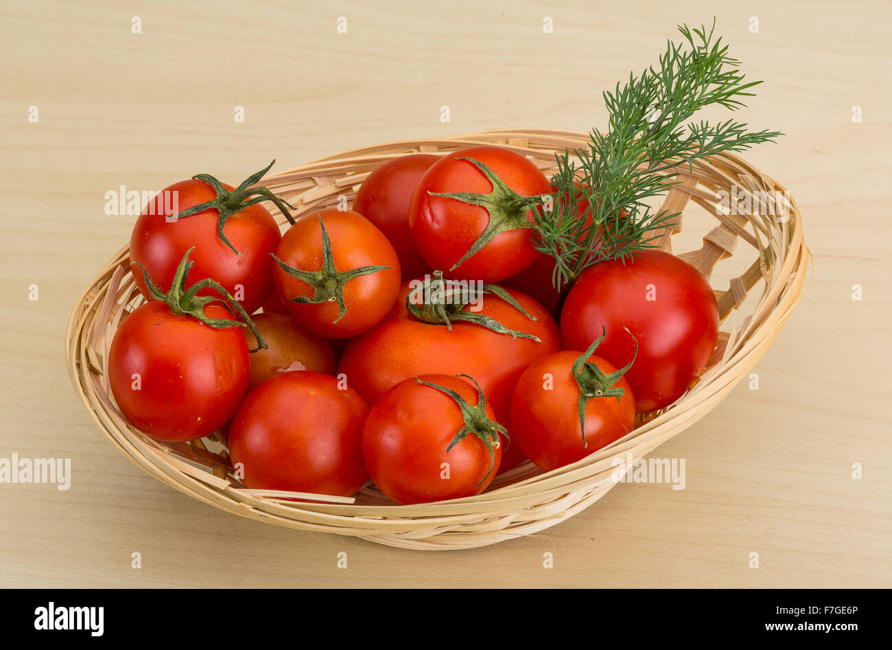 Fresh ripe Cherry tomatoes in the basket Stock Photo - Alamy