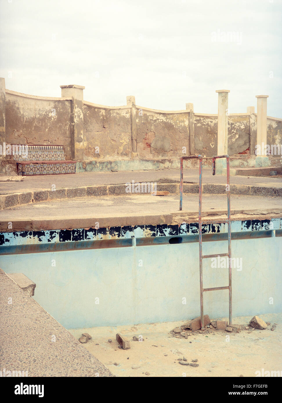 An abandoned and decaying swimming pool in Sidi Ifni ia former Spanish colony on the West coast of Morocco, North Africa. Stock Photo