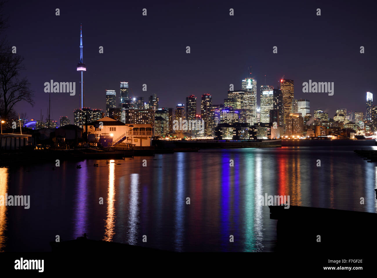 Queen City Yacht club house with Toronto city skyline lights reflected at Algonquin Island Stock Photo