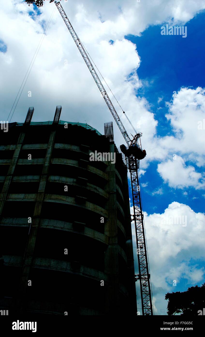 Modern technology building construction truck for cement making and cranes for lifting Stock Photo