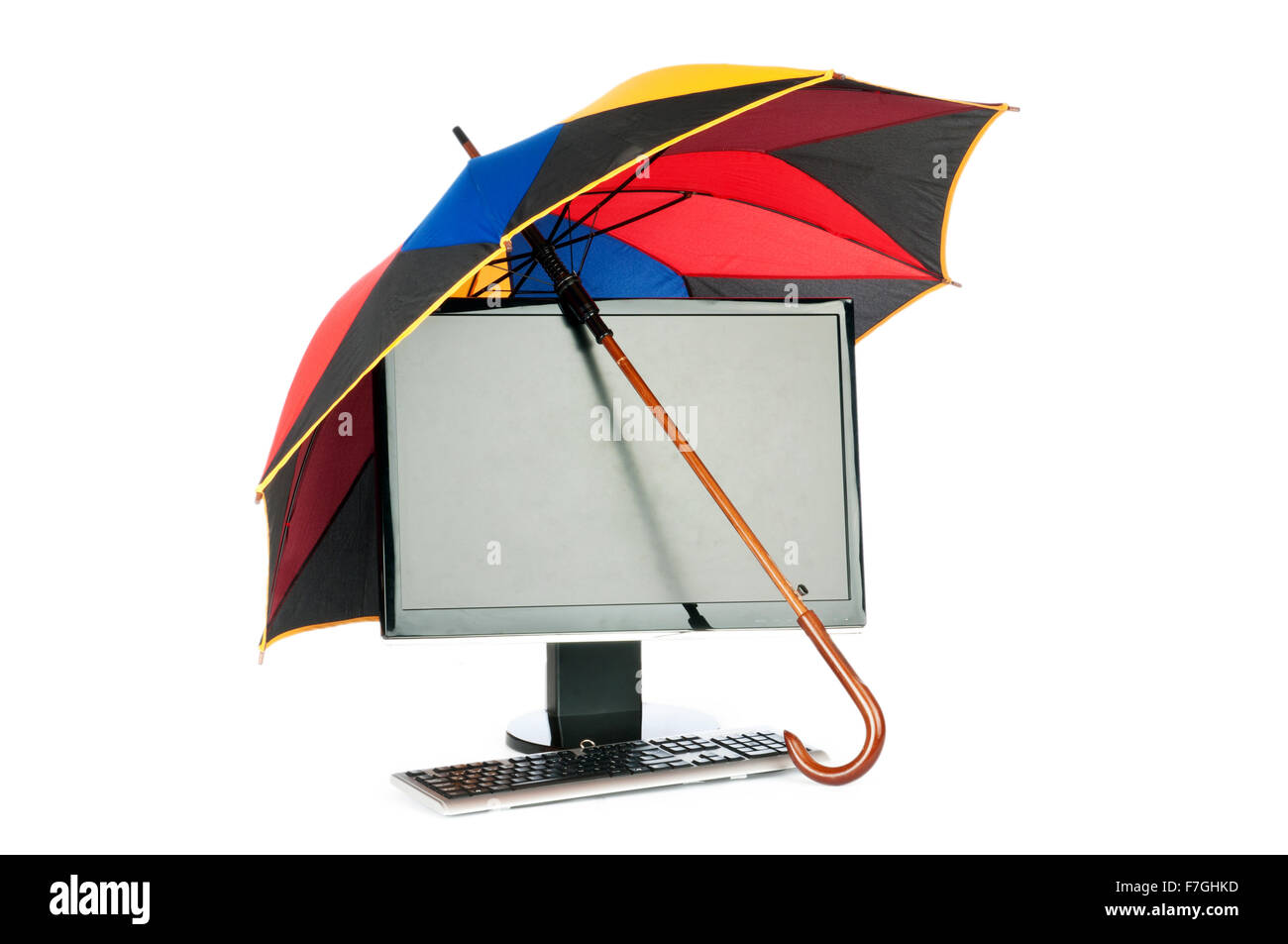 Computer under protection of umbrella Stock Photo Alamy