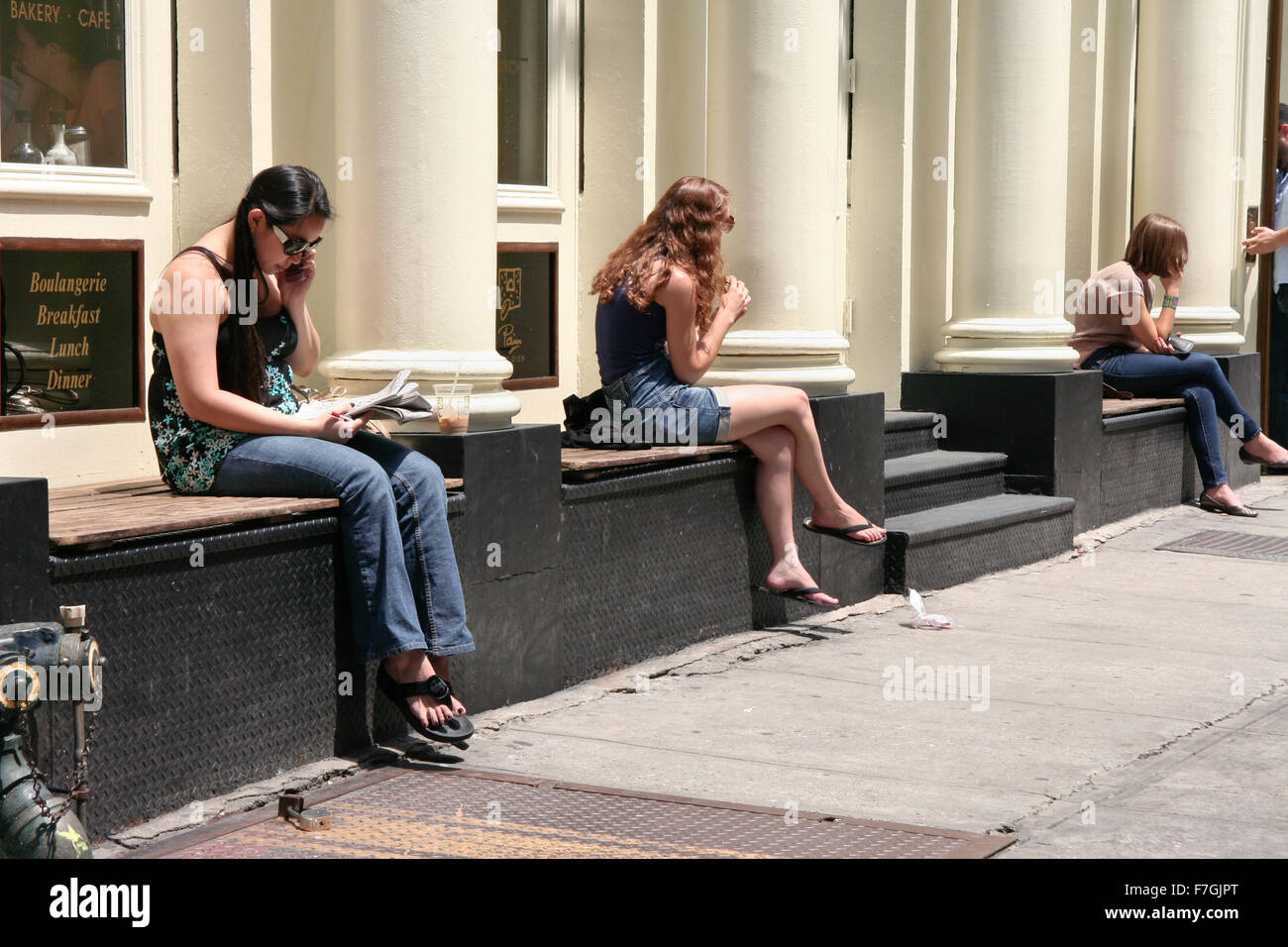 New York June 24 Three Young Girls Sitting On Store Bench At